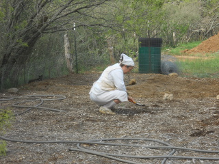 Sue Planting the Garden